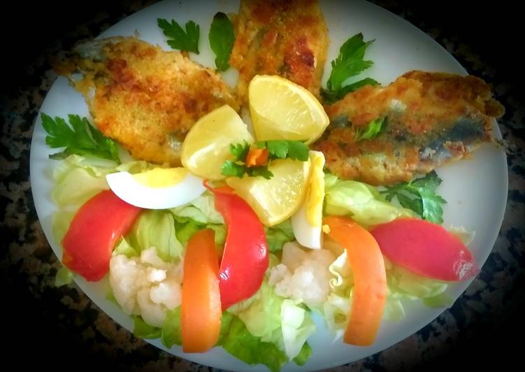 Sardine fritters with green salad