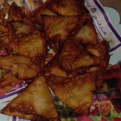 Chicken samosa and roll A picture of Chicken samosa and roll.