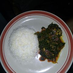 A picture of Vegetable sauce and rice.