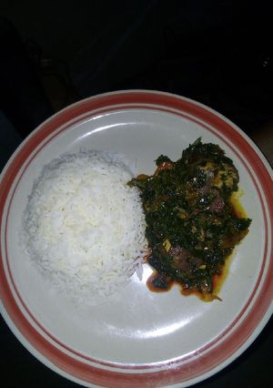 A picture of Vegetable sauce and rice.
