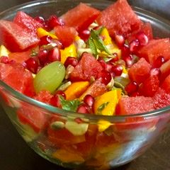 A picture of Fruit salad with dried fruits.