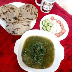 A picture of Mooli k patton ki saag bajrey ki roti k Sath.