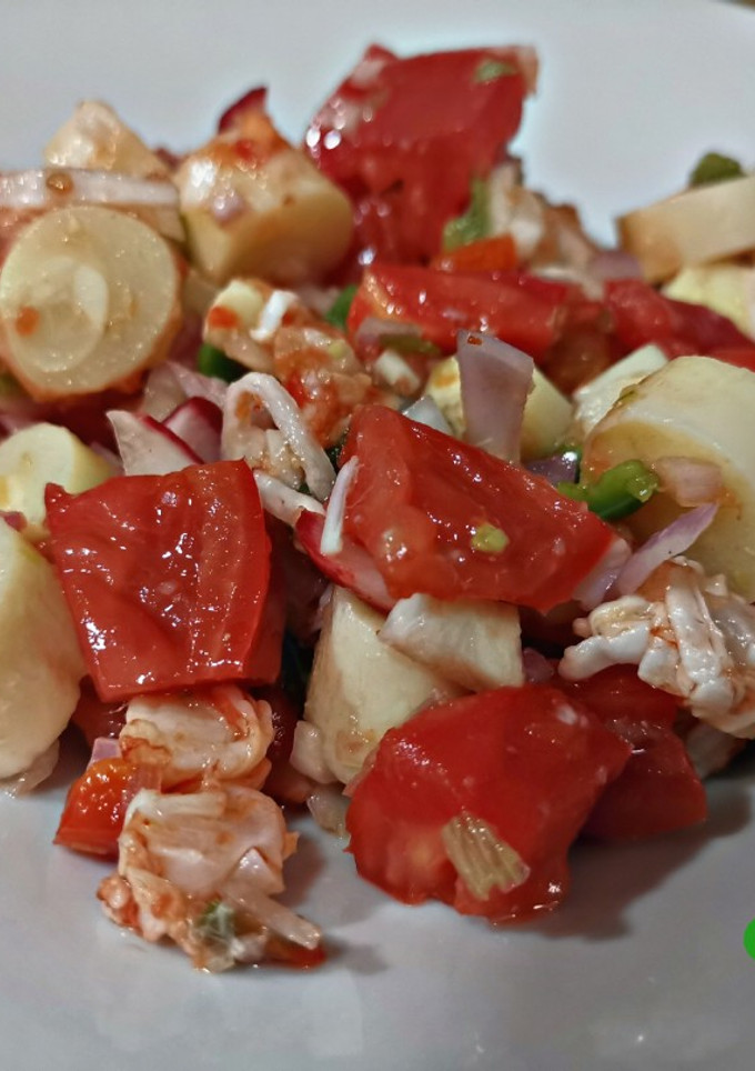 Una foto de Ceviche de palmitos y gambones