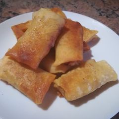 A picture of Cheese and corn spring rolls.