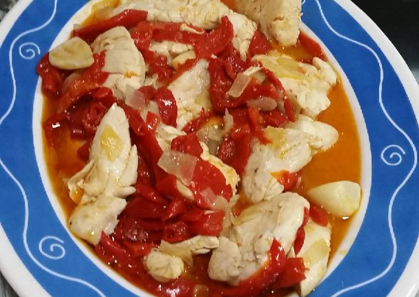 Pollo con pimientos asados