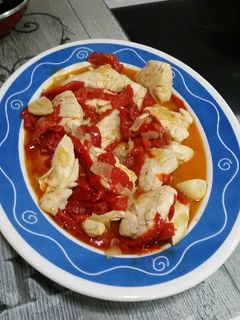 Una foto de Pollo con pimientos asados