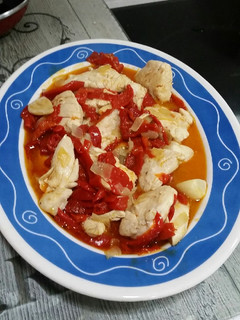 Una foto de Pollo con pimientos asados