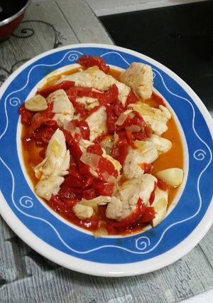 Una foto de Pollo con pimientos asados