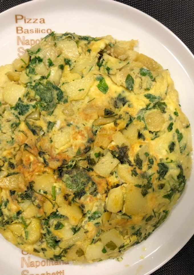 Una foto de “Tortilla de patata i perejil”