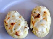 Una foto de papa rellena con champignones