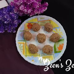 A picture of Fresh Coconut and Jaggery Laddoos.