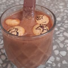 A picture of Yummy chocolate and biscuits iced shake.