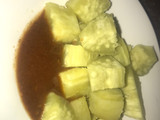 Boiled sweet potatoes with kuli kuli