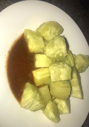 A picture of Boiled sweet potatoes with kuli kuli.
