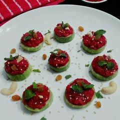 A picture of Beetroot Hummus Cucumber Canape.