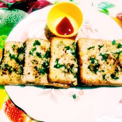A picture of ટેસ્ટી ગાર્લિક બ્રેડ.