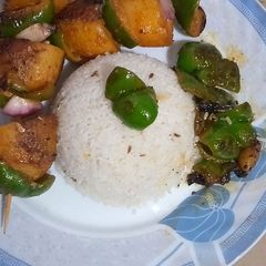 A picture of Tandoori Smokey aloo with zeera rice🥔🍚.