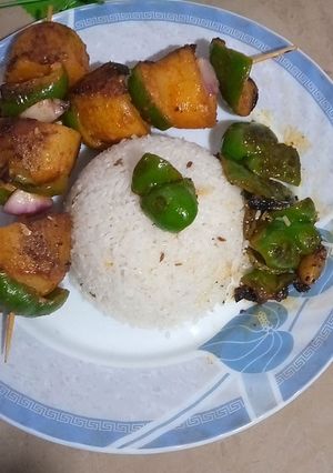 A picture of Tandoori Smokey aloo with zeera rice🥔🍚.