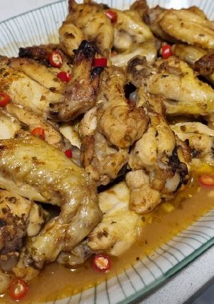 Una foto de Alitas de pollo al tequila