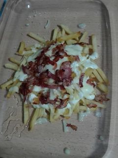 Una foto de Patatas bacon cheese fries