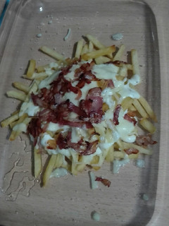Una foto de Patatas bacon cheese fries