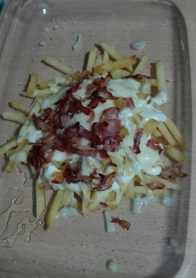Una foto de Patatas bacon cheese fries