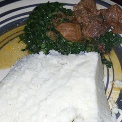 A picture of Ugali beef with spinach.