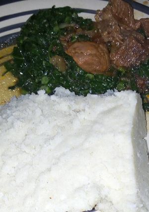 A picture of Ugali beef with spinach.