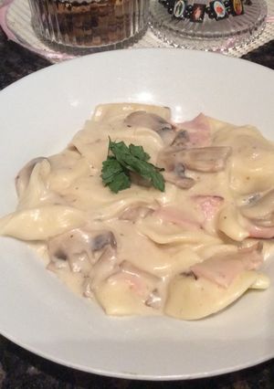A picture of Creamy mushroom and bacon ravioli.