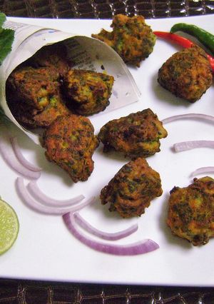 A picture of Kumro Pata Bora (Pumpkin Leaves Pakoras - Bengali Style).