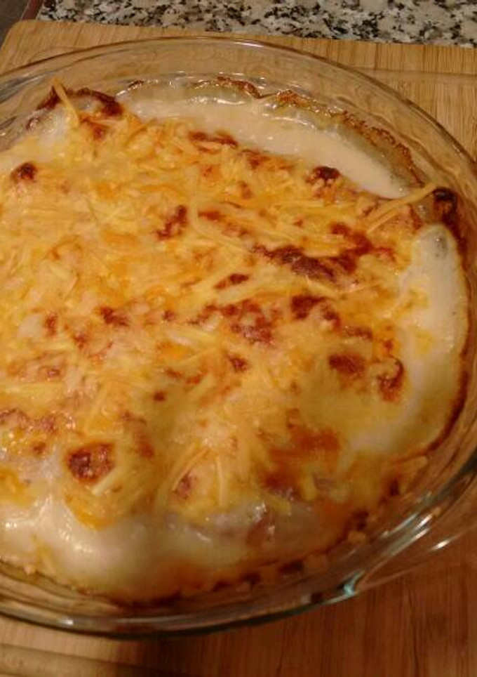 Una foto de Espárragos con jamón y bechamel