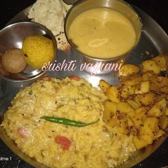 A picture of Kadhi khichdi with Achari aloo.