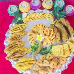 A picture of #Karela,fish,layers,flower,  net and triangle shaped Nimkis.