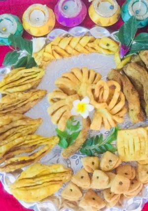 A picture of #Karela,fish,layers,flower,  net and triangle shaped Nimkis.