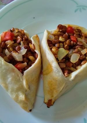 Una foto de Sfijas vegetarianas de lenteja