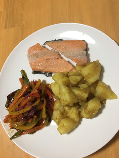A picture of Curry Potatoes, sweet chilli stir fry with salmon.
