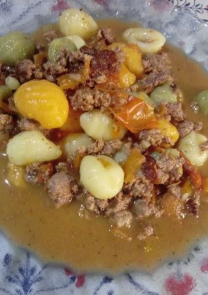 Una foto de Ñoquis con salsa