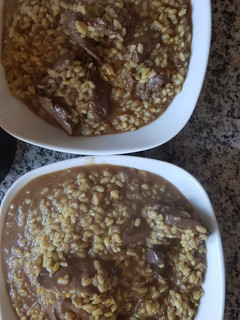 Una foto de Arroz con asaduritas de pollo. Olla GM D