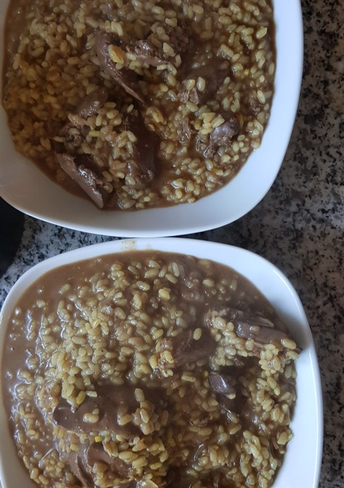 Una foto de Arroz con asaduritas de pollo. Olla GM D