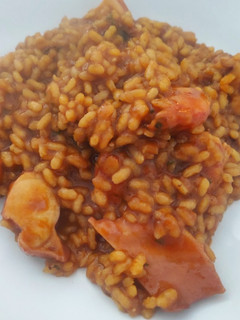 Una foto de Arroz meloso de pulpo y langostinos