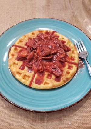 A picture of Keto Waffles with Strawberry Pecan Topping.