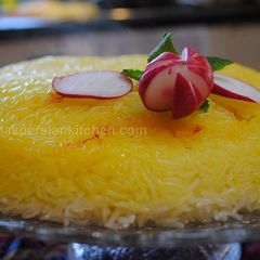 A picture of Persian steamed rice with Saffron crust.