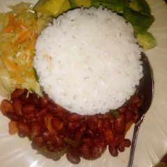 A picture of Beans stew with rice,cabbage.