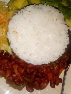 A picture of Beans stew with rice,cabbage.