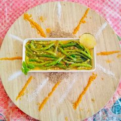 A picture of Green Chilli Pickle with lemon juice.
