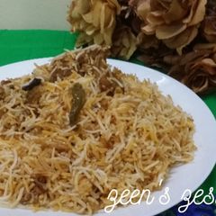 Hyderabadi Kachchi Aqhni Mutton Dum Biryani A picture of Hyderabadi Kachchi Aqhni Mutton Dum Biryani.