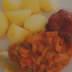 A picture of Boiled Irish with carrot sauce and fried chicken breast.