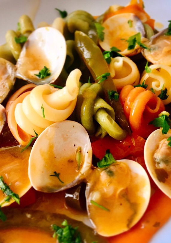 Una foto de Trottole con salsa de almejas