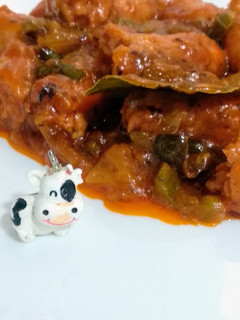 Una foto de Longaniza de cerdo en salsa de tomate... para mojar pan!!!