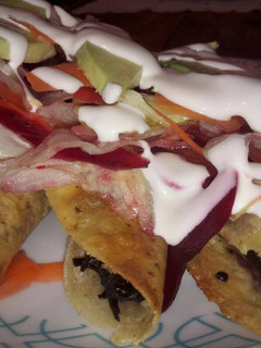 Una foto de Tacos dorados de JAMAICA